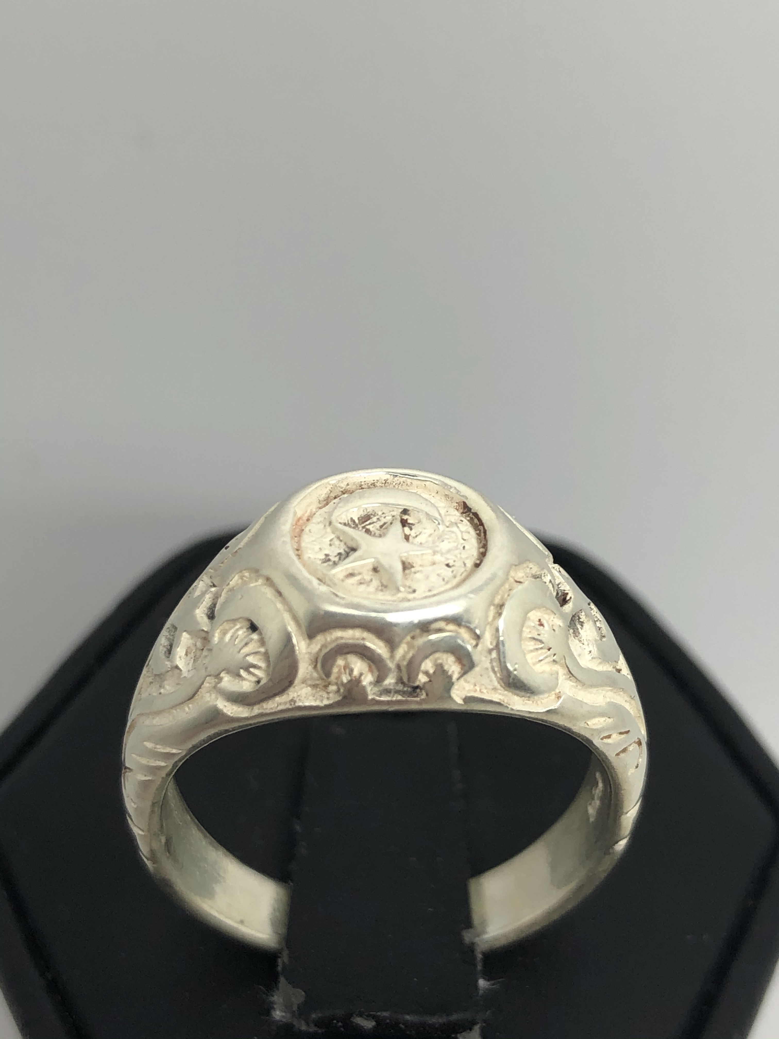 Unisex Sterling Silver ring with moon and star. Size 9