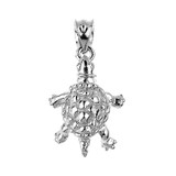 White gold turtle pendant.