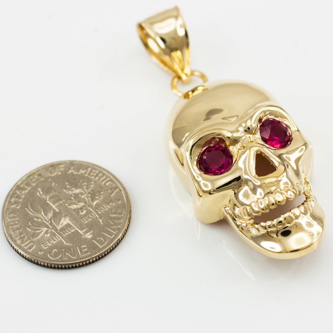Gold Skull Pendant with Red CZ Eyes