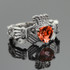 White Gold Diamond Claddagh Ring Garnet center stone.