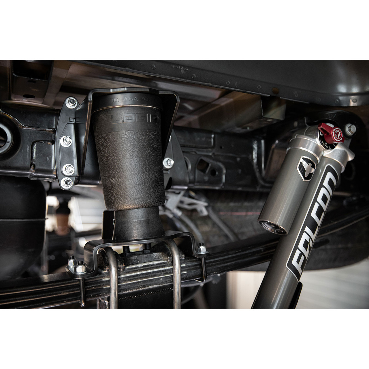 88-21150 - LOGIQ 2015-2026 Ford F-150 Load Leveling Helper Spring Kit Installed