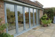 Opening Visofold Aluminium Bi-Folding Doors Outdoors