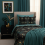Twin bed color coordinated peacock bedding