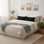 Serene bedroom with cream bedding and rectangular Adventure Freedom Travel pillows