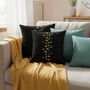 Cozy sofa corner with butterfly pillows in focus