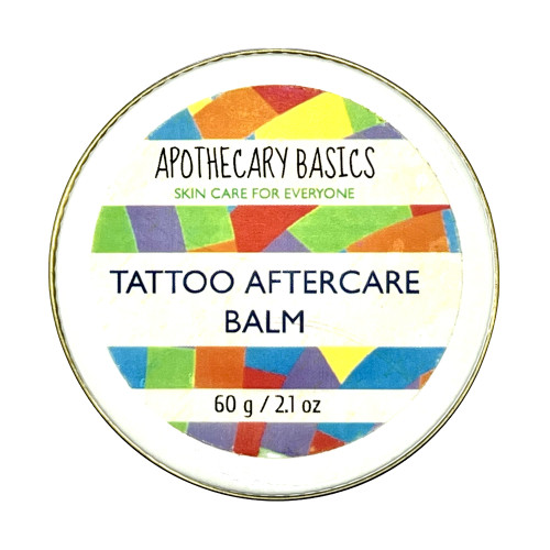 Tattoo Aftercare Balm large glass jar with a metal lid on white background