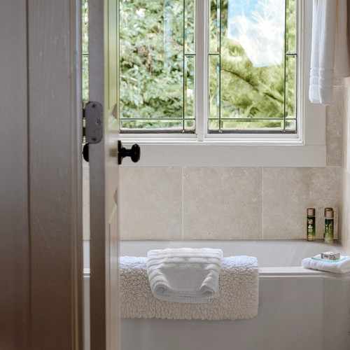 Ivory Premium Travertine 12×12 Filled/ Honed Tiles