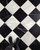 Ocean White Honed & Nero Marquina Honed 12x12 Set in Checkerboard Pattern