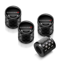 Dodge in Black on Real Carbon Fiber Barrel Black Aluminum Tire Valve Stem Caps