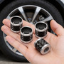 Ford Maverick in-White on Real Carbon Fiber Barrel Silver Premium Aluminum Tire Valve Stem Caps -Set of 4