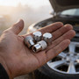 Ford Maverick in-White on Shining Silver Premium Aluminum Tire Valve Stem Caps -Set of 4