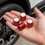 Ford Maverick in-Black on Red Cylinder-Style Premium Aluminum Tire Valve Stem Caps -Set of 4