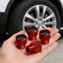 Ford Maverick in-White on Red Premium Aluminum Tire Valve Stem Caps -Set of 4