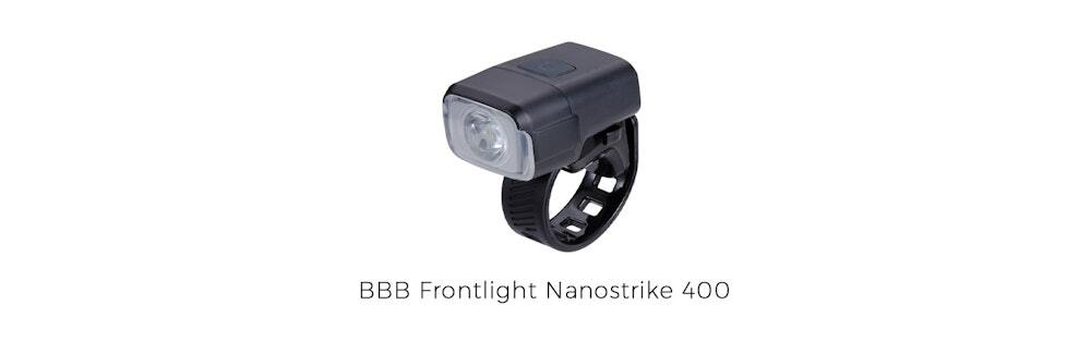 BBB Frontlight Nanostrike 400, a compact and durable black bicycle light with a clear lens and adjustable black strap