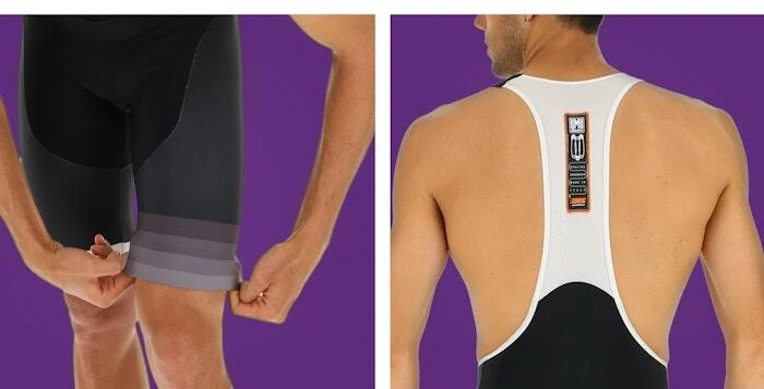 Close-up of a cyclist adjusting the elastic hem of high-performance bib shorts, showcasing a reflective stripe