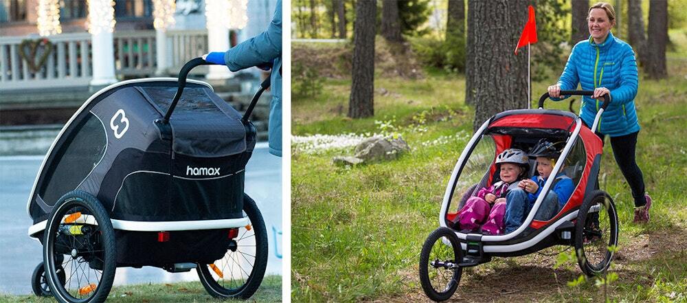 Collage of two images showing Hamax bike trailers a black Hamax trailer parked outdoors on the left, and a woman pushing a red Hamax trailer with two children through a forest path on the right.