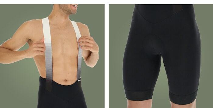 Cyclist wearing black cycling bib shorts with white straps, adjusting the straps while smiling