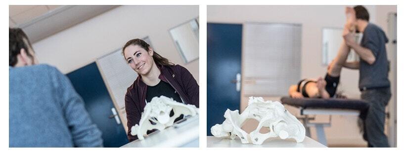 Physical therapy session featuring a pelvic bone model on a table and a therapist assisting a patient with a leg stretch.