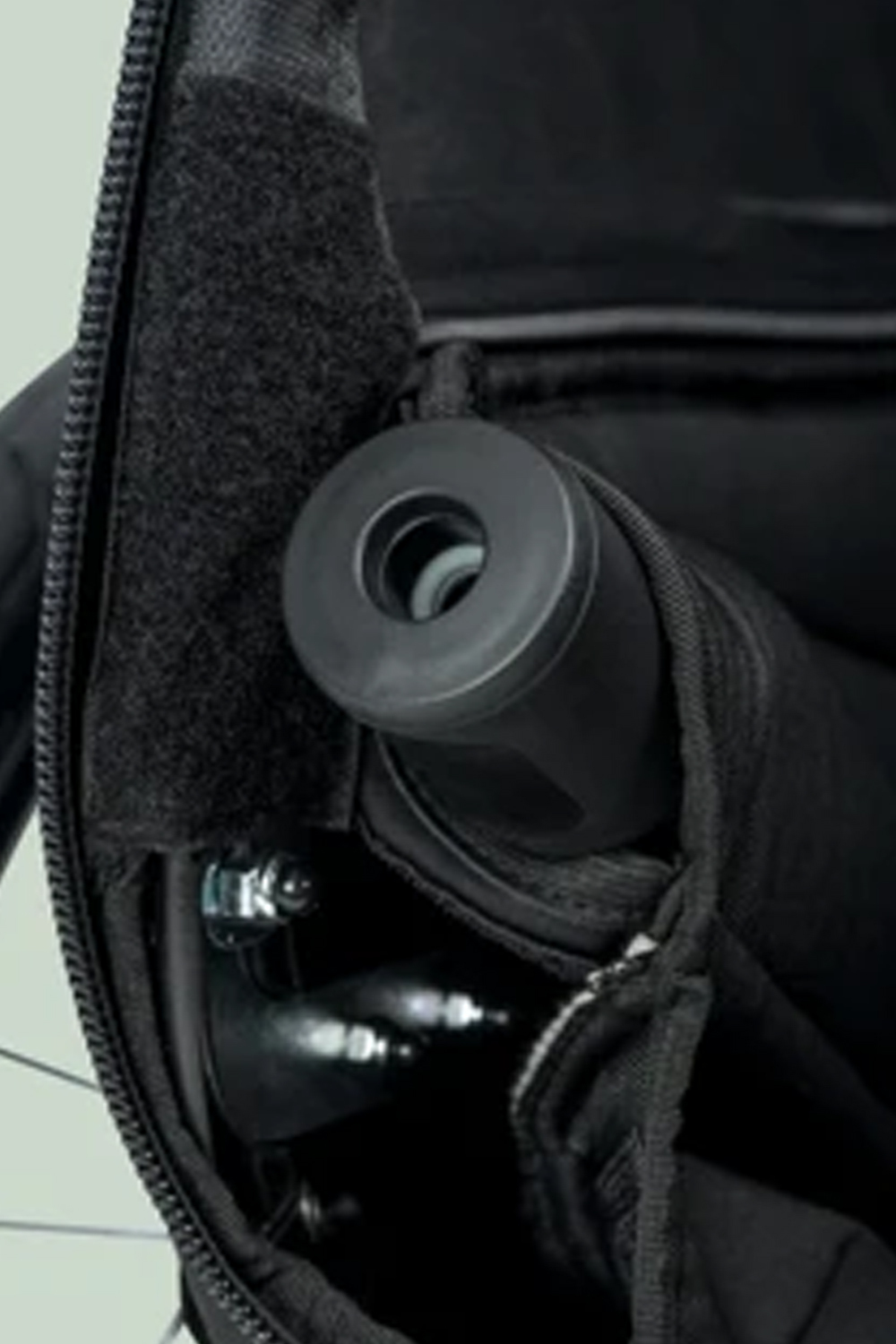 Hamax Pluto M dog trailer showing bike arm stored in dedicated internal pocket when in stroller mode