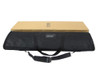 A premium roll up banner stand packed in a heavy-duty black padded carrying bag alongside its cardboard shipping box.