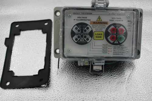 VOLTAGE TEST STATION 
 P-S18521-M3RX-T178 
 VOLTAGE 
 VOLTAGE 
 IF ILLUMINATED 
 TEST POINTS 
 AWARNING 
 E207344 
 VAC VDC 
 QUALIFIED PERSONNEL 
 ENC. 
 FOLLOW YOUR FACILITY 
 DANGER 
 TYPE 4 
 SAFETY PROCEDURES 
 CE 
 WHEN USING 
 L3 
 THIS DEVICE 
 L2 
 13 
 L2 
 RoHS 
 POWER 
 LOAD 
 TEST, POINT 
 L9 
 + 
 GND 
 SIDE 
 L1 
 DANGER 
 102 kQ 
 WOL1 
 NOTE: 
 102 kQ 
 TEST POINT ASSEMBLY 
 WWOL2 
 102 kg 
 WITH 102 kQ IMPEDANCE 
 102 kQ 
 OL3 
 ON L1, L2, L3 & GND 
 AFFECTS VOLTAGE 
 READINGS + 2%