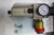 E0034791 
 CAUTION 
 Operating Pressure 40 PSI 
 Higher air pressures may cause component damage 
 Filter/Regulator is supplied with a Pop-Off Valve. 
 (45 PSI MAJD) 
 BU 
 100 
 TOW # 1103388 
 L 
 L 
 V 
 V 
 120 
 40 
 TTITY 
 O 
 N 
 20 
 bar 
 - 
 11 
 TI 
 .140 
 ps 
 160 
 VIL 
 PRESS.RANGE:0.5-8.5BAR 
 MAXPRE 
 MAX. TE 
 AVOID CE 
 INNER 
 LORIDE 
 ACETATE 
 SULFUR 
 OSENE 
 SOLVEN 
 RECT S 
 CAS 
 ADC