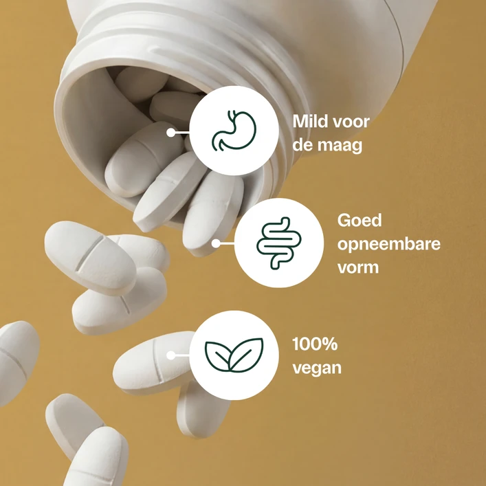 Golden Naturals Magnesium Bisglycinaat 300 mg witte capsules in een open flesje en los.