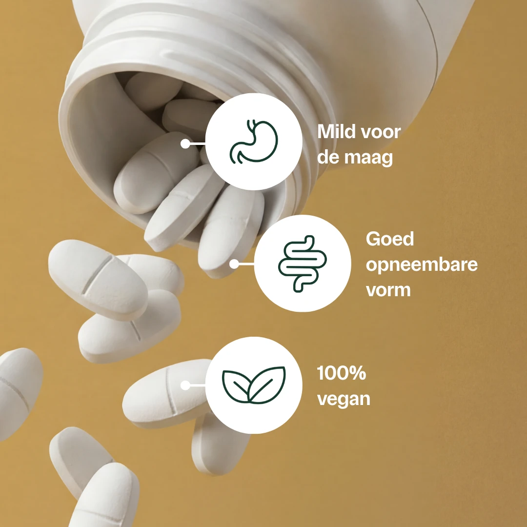 Golden Naturals Magnesium Bisglycinaat 300 mg witte capsules in een open flesje en los.