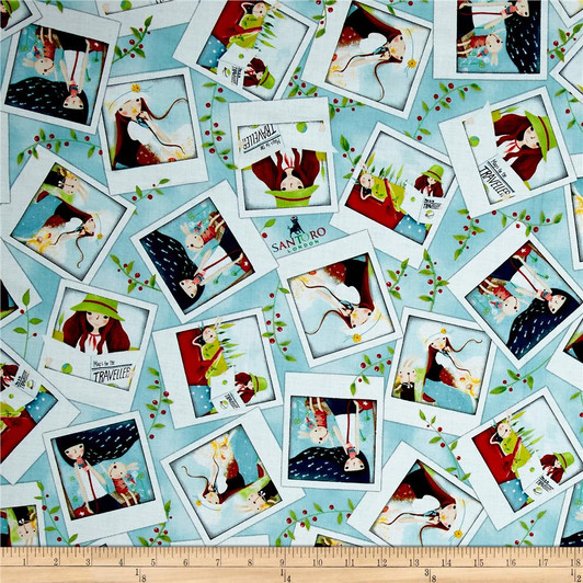 The Traveller Girl Photo Toss Light Blue Cotton Quilting Fabric The Traveller Girl Photo Toss Light Blue Cotton Quilting Fabric