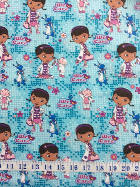 Disney Doc McStuffins We Care Cotton Quilting Fabric 1/2 YARD