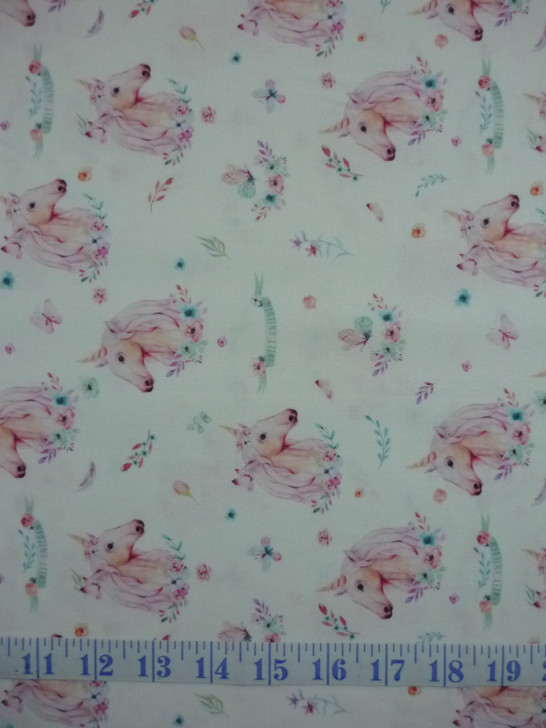 A Magical Time Unicorns and Butterflies White Background Cotton Quilting Fabric 1/2 YARD