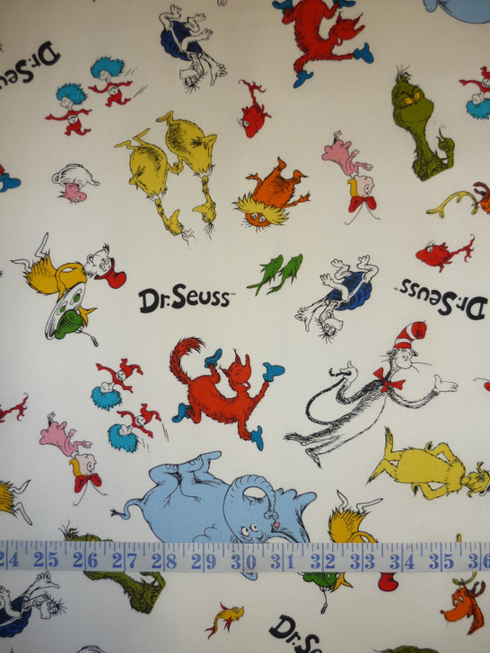 Celebrate Seuss Character Toss White Background Cotton quilting Fabric