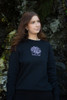Unisex Flower Sweatshirt with small flower print on the front in black.