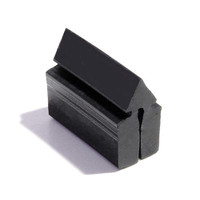 Door Bumper.  13/16" high X 1/2" wide X 1" long.  Each-DB 33-A