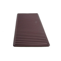 Rubber Heel Mat.  Meant to be sewn into carpeting.  Brown-RM 40-C