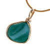 This pendant is set in our Original Wire Bezel© setting that leaves this natural UNALTERED sea glass piece just the way it was found on the beach. Smoothed only by tides and time, a real treasure for any sea glass lover.