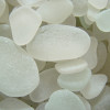 Though white sea glass can come in many hues like pale blue, green and pink, the pure white is the most desirable.