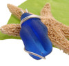 A good piece of Blue Certified Genuine Sea Glass in a simple setting. Neat ridging on the piece indicates it was once the top of a medicine bottle.

This sea glass is UNALTERED from the way it was found on the beach!