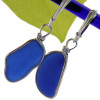 Vivid cobalt blue sea glass pieces set in our Original Wire Bezel© setting. This pair comes on quality sterling silver leverback ear wires.