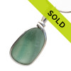 A very unusual piece of subtle mixed seafoam green sea glass from England set in our Original Wire Bezel© setting.
Sorry this pendant has been SOLD!