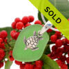 Beach found green sea glass is combined with a solid sterling sea turtlecharm and presented on an 18 Inch solid sterling snake chain.

SORRY THIS HAS SOLD
