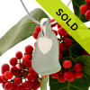 Pale aqua blue sea glass with a sterling heart charm on a sterling silver bail.