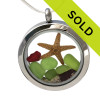 Green and rare red sea glass and a real starfish and beach make this a great locket necklace for the holidays.