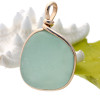 What a great perfect piece of sea glass done in our Orignial Wire Bezel© setting that leaves this sea glass specimen open.

A great piece of vivid seafoam green sea glass UNALTERED from the way it was found on the beach. 