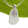 Beach found pure white sea glass necklace is combined with a solid sterling sandollar charm and presented on an 18 Inch solid sterling snake chain.