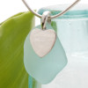 A perfect piece of LARGE aqua sea glass set on a solid sterling hand cast bail with a sterling silver charm. A perfect sea glass necklace for any sea glass lover!