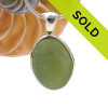 Ultra rare opalescent green sea glass in our Deluxe Wire Bezel setting.
Sorry this sea glass jewelry piece has sold!