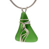 A stunning perfect vivid green sea glass piece found on the beaches of the Outer Banks of North Carolina.