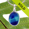 A beautiful larger piece of vivid aqua and blue green sea glass set for a necklace in our Original Sea Glass Bezel© in solid sterling silver setting.