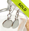 These white sea glass earrings in sterling have been SOLD!
Look for available earrings at http://bytheseajewelry.com/brown-and-white-sea-glass-earrings/?sort=FeaturedItems